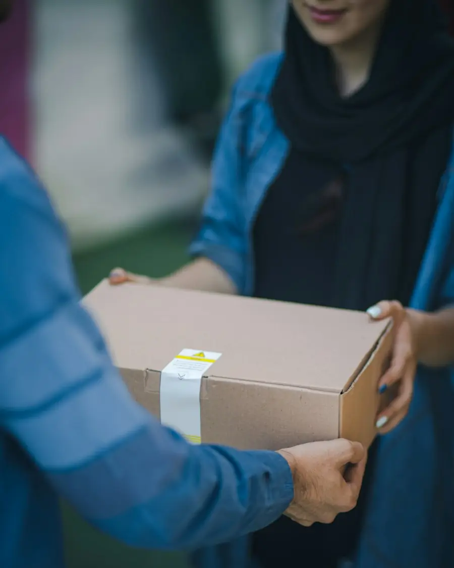 Parcel being handed over at the door